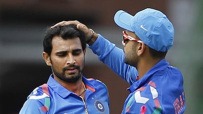 Mohammed Shami, left, and Virat Kohli have been among the few bright spots for India during their tour of South Africa. Siphiwe Sibeko / Reuters