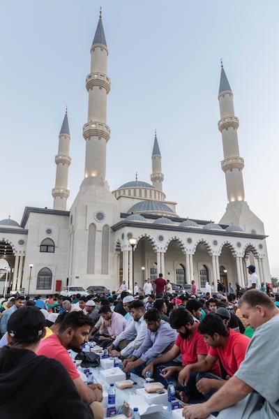 Iftar meals are distributed to thousands of people each day during Ramadan at Al Farooq Omar Bin Al Khattab Mosque in Dubai. Antonie Robertson / The National