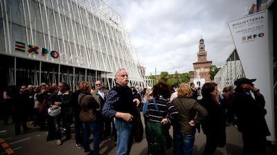 People queue for Expo 2015 tickets at Piazza Castello in Milan. The Italian city last hosted the world’s fair in 1906. Filippo Monteforte / AFP