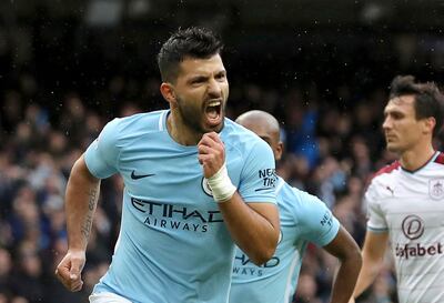 Sergio Aguero's penalty against Burnley made him Manchester City's joint all-time top goal-scorer. Martin Rickett / PA