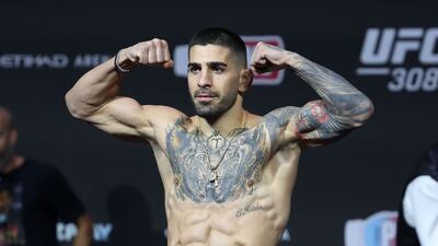 UFC featherweight champion Ilia Topuria weighs in at 145lbs ahead of his title fight against Max Holloway.