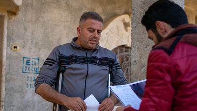 Also benefiting from the NGO's services is Ibrahim Al Sheikh, 45, from the village of Bithynia, Iblib province. He too was injured in the earthquake. ‘The memory is extremely painful for me, because I suffered a severe injury to my feet and treatment continues now, a year on,’ he told The National