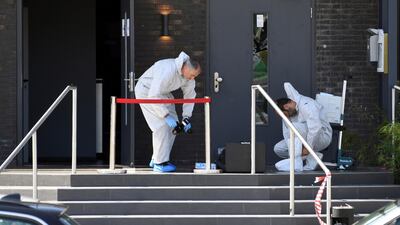 Forensic experts investigate the nightclub in the German city of Constance where a gunman opened fire early on July 30, 2017. Felix Kaestle / DPA via AP