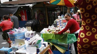 A street vendor selling products in El Salvador. The country passed a law on Wednesday allowing Bitcoin to be used as legal tender. Other emerging market nations are developing their own central bank digital currencies. EPA