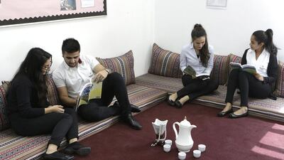 Pupils of Dubai British School reading at the majlis. Staff encourage the use of common phrases. Jeffrey E Biteng / The National