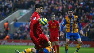 January 6, 2013: Suarez further endeared himself to English football fans when he handled the ball in the lead up to his goal during the FA Cup third round match against Mansfield Town. Liverpool won the match 2-1, which only added additional fire to Suarez's critics. Getty Images