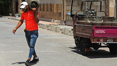 Mr Abbas, 22, says he is carrying on the trade of his father. AFP