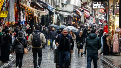 A busy shopping street in Istanbul. Turkey has been increasing interest rates since last year to rein in inflation. AP