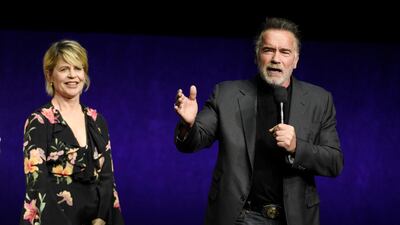 Arnold Schwarzenegger talks about upcoming film Terminator: Dark Fate as fellow cast member Linda Hamilton looks on during CinemaCon 2019 in Las Vegas. (Photo by Chris Pizzello/Invision/AP)
