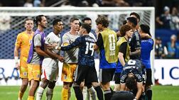 England's Jude Bellingham and Argentina's Nicolas Otamendi clash at the end of the World Cup semi-final. Reuters