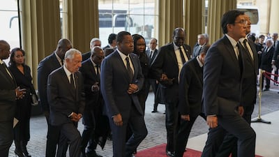 World leaders and heads of state arrive for the reception at Buckingham Palace in London. PA