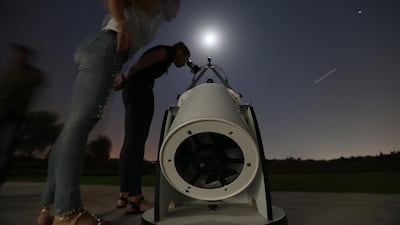 A long exposure picture shows stargazers at Al Thuraya Astronomy Center in Dubai. EPA/ALI HAIDER