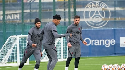 Neymar, Kylian Mbappe, and Lionel Messi train at the Paris Saint-Germain training ground. AP