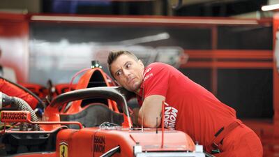 A race engineer is tuning a Ferrari car. Victor Besa / The National