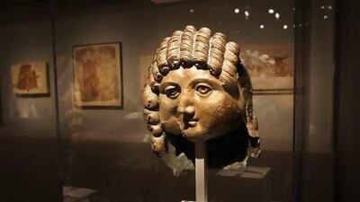 A bronze head from the first or second century BC found at Qaryat Al-Faw, part of the Roads of Arabia exhibit at the Arthur M Sackler Gallery in Washington, DC. Tish Wells / MCT via Getty Images