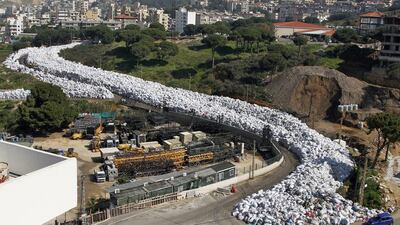 Waste piles up in the northern Beirut suburb of Al Fanar, in February last year. The refugee influx from Syria and a multi-year political gridlock caused a garbage crisis that spilled over into 2016, bringing street protests and a spike in respiratory problems in the Lebanese capital. Nabil Mounzer / EPA