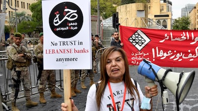 A protester outside the Lebanese Parliament in Beirut. EPA
