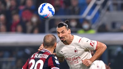 AC Milan's Zlatan Ibrahimovic in action with Bologna's Lorenzo De Silvestrii. AP