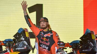 Red Bull KTM's Australian rider Toby Price waves during the podium ceremony in Jeddah. AFP