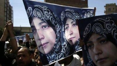 Students and activists protest against the arrest of the human-rights activist Tawakul Karaman in Sana'a yesterday.