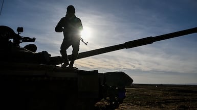 Syrian government forces in position a few kilometres away from the SDF-held city of Hasakah. Getty Images