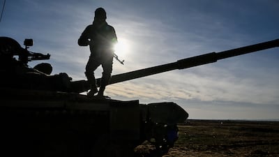 Syrian government forces in position a few kilometres away from the SDF-held city of Hasakah. Getty Images