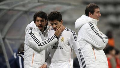 Enzo Fernandez reacts at the end of the game on Tuesday. Franck Fife / AFP / March 11, 2014
