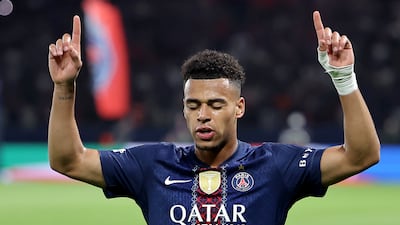Desire Doue celebrates after scoring Paris Saint-Germain's first goal in their 2-0 Uefa Champions League quarter-final win over Liverpool. EPA