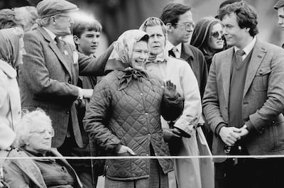 Queen Elizabeth, pictured here in 1984 at the Windsor Horse Show, has long been a fan of the Barbour jacket. Getty Images
