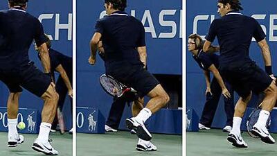 A combination photo shows Roger Federer of Switzerland returning a winning shot between his legs while playing Brian Dabul of Argentina during their opening match at the US Open on Monday night.
