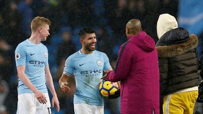 Sergio Aguero, centre, scored four goals for Manchester City in their 5-1 win over Leicester City. Andrew Yates / Reuters