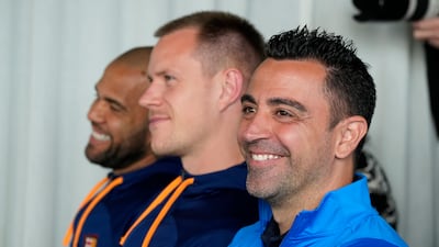 Xavi Hernandez, Marc-Andre ter Stegen and Dani Alves during a press conference in Sydney. AP