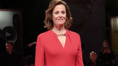 Sigourney Weaver in a red Valentino jumpsuit for the 'Master Gardner' premiere at the Venice International Film Festival on September 3. EPA