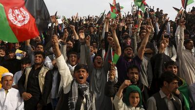 Afghan cricket fans welcome Afghanistan's national cricket team, after their Twenty20 world cup tournament, in Kabul, REUTERS/Omar Sobhani