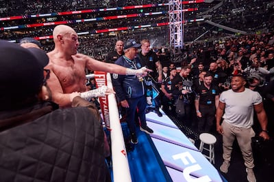 Tyson Fury points at Anthony Joshua after beating Arslanbek Makhmudov at Tottenham Hotspur Stadium in April. Getty Images