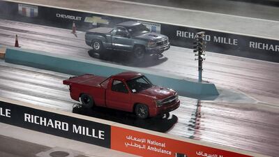 A Chevrolet truck and a GMC truck go head to head. Pawan Singh / The National