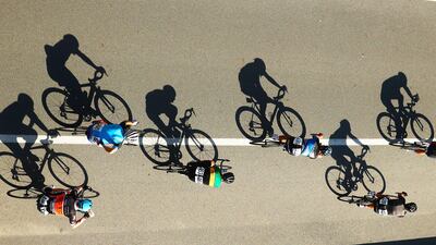 Shadows are cast by cyclists during the Cycling Road Race Test Event along Currumbin Bay in the Gold Coast, Australia. Scott Barbour / Getty Images