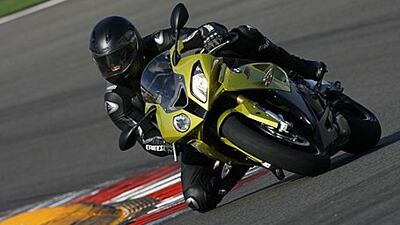 The BMW S1000RR's traction control will kick in if you lean too far over on the bike. When it does will depend on what mode you're riding in.