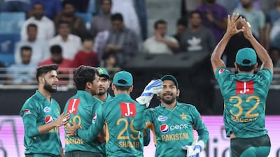 Pakistan captain Sarfraz Ahmed, second right, is the heartbeat of the team and the only ever-present on their 33-match unbeaten run in T20 matches. AFP