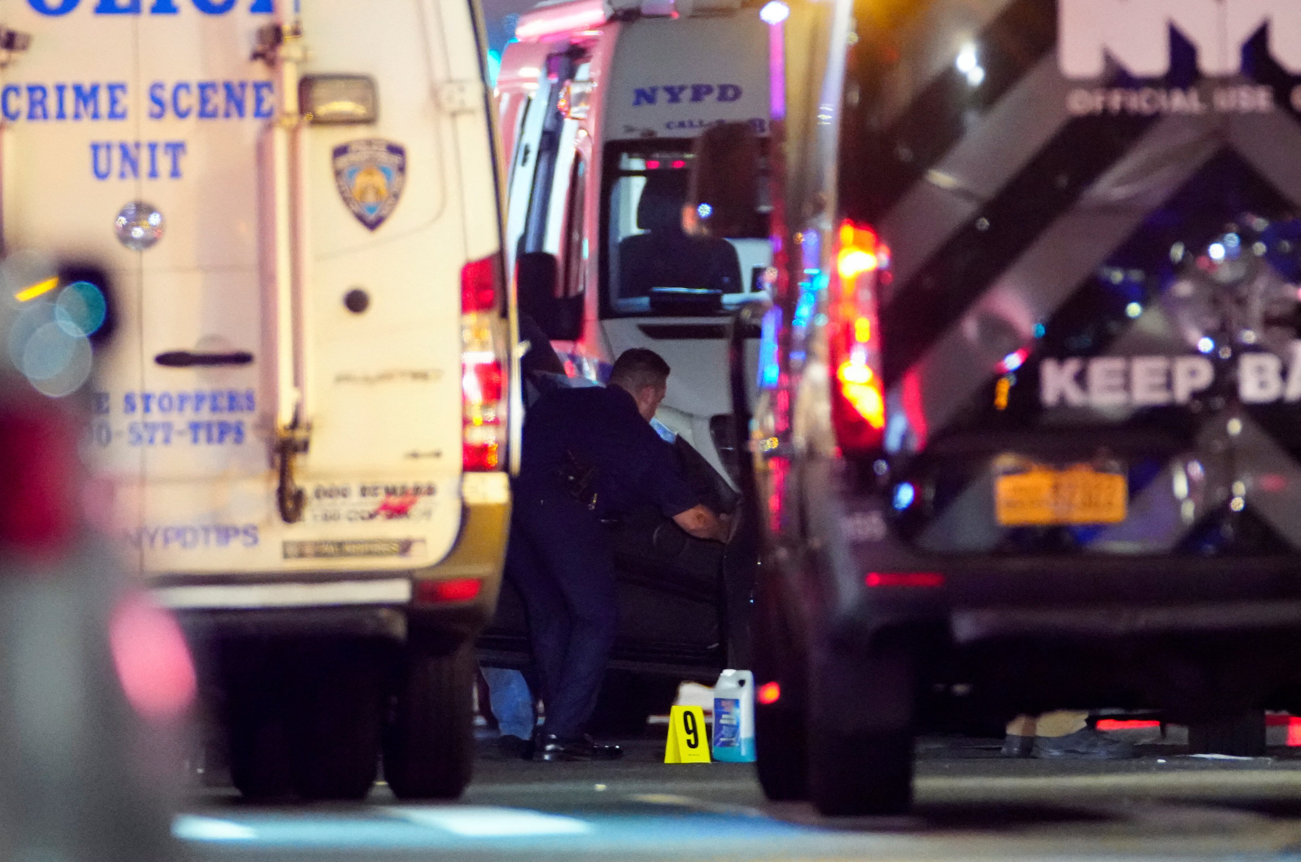 Gunman kills 4, including police officer, in shooting at New York City ...