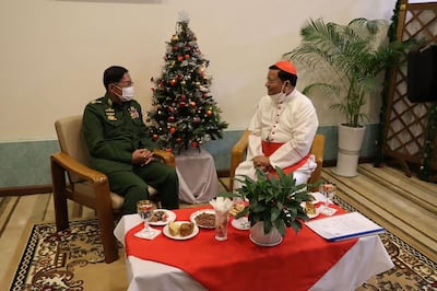 Cardinal Charles Bo attends a Christmas event with Myanmar's junta chief Min Aung Hlaing in Yangon. Myanmar Military Information Team / AFP