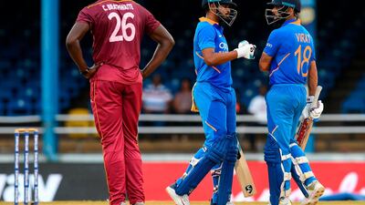Shreyas Iyer, centre, and Virat Kohli, right, helped India dominate the West Indies during the limited-overs series. AFP