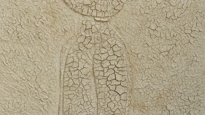 'Temporary Escape' by Sliman Mansour is made of cracked mud and acrylic on wood, showcasing a constract in material. Courtesy the artist and Zawyeh Gallery