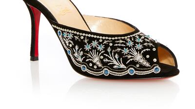 Christian Louboutin mules, Dh10,175. Courtesy Moda Operandi