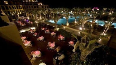 The patio and pool area of the Hilton Resort and Beach Club in Ras al Khaimah. Jeff Topping / The National