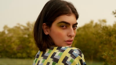 Top, Dh1,310; and skirt; Dh1,415, both by Pleats Please Issey Miyake at Matches Fashion