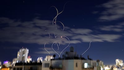 Rocket trails in the sky above the Israeli city of Netanya during a barrage of Iranian missile attacks. AFP