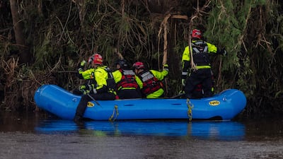 Search and recovery workers dig through debris looking for any survivors or remains of people swept up in the flash flooding at Camp Mystic. AFP