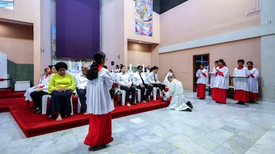 People attend the Maundy Thursday service at St Joseph's Cathedral in Abu Dhabi. All photos: Victor Besa / The National