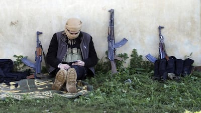 A rebel fighter in the northern countryside of Hama in Syria in 2015. Cheg Cheg, who was killed in April, was the head of a complex network of weapons trading which supplied arms to rebel groups across Syria. REUTERS/Khalil Ashawi